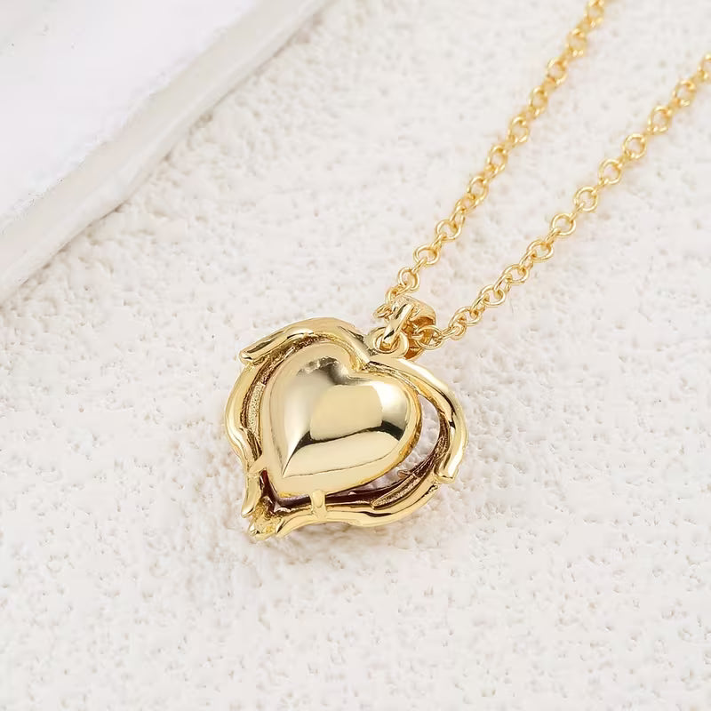 Gold Necklace Gobnait with Ruby Heart and Angel Wings