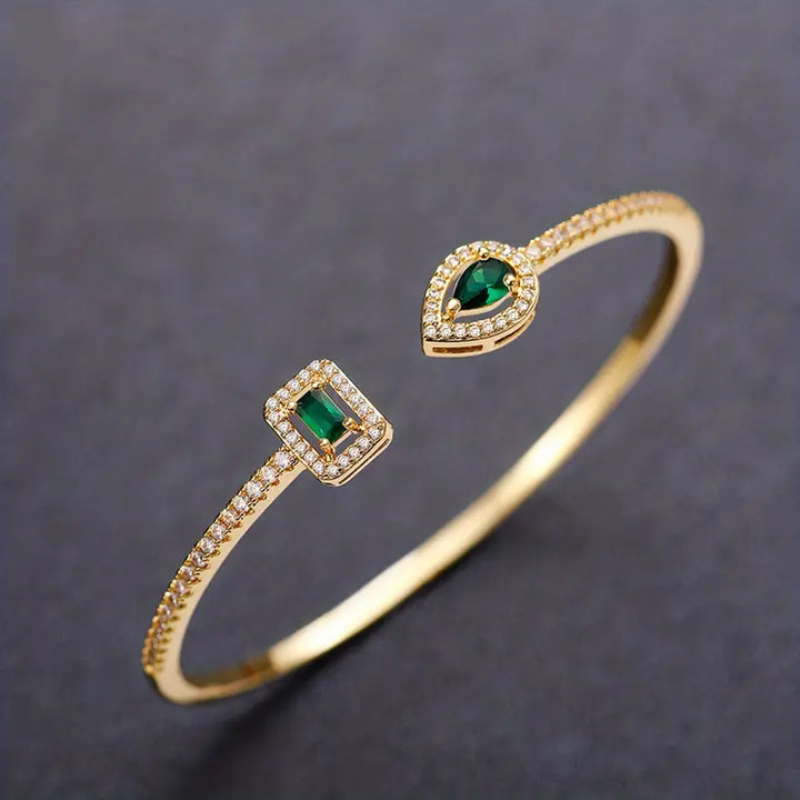 Gold Cuff Bracelet Órla with Emerald