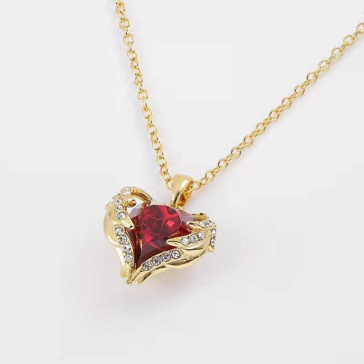 Gold Necklace Gobnait with Ruby Heart and Angel Wings