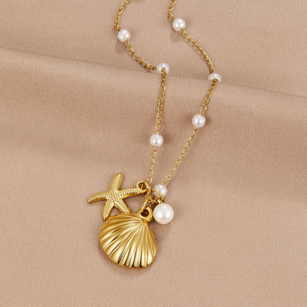Gold Charm Necklace Dervla with Shell and Starfish