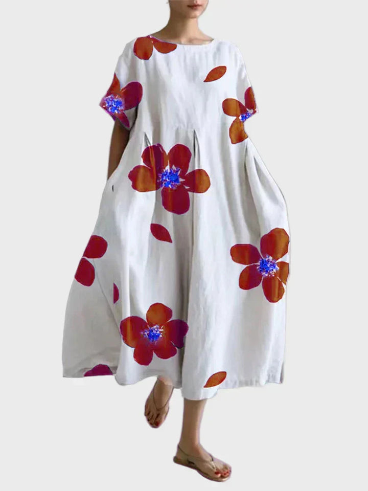 Weisses Kleid mit grünen Blüten