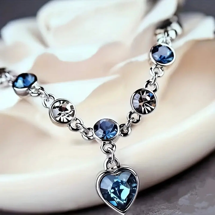 Silver Charm Bracelet Caoimhe with Blue Crystal Heart