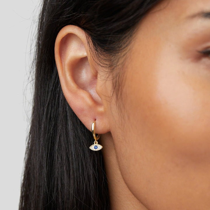 Gold Drop Earrings Íde with Sapphire Eye