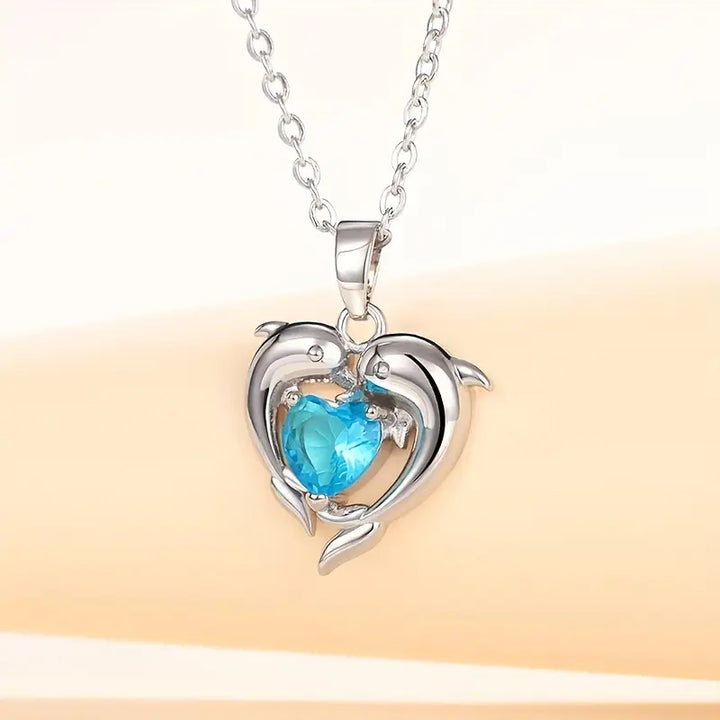 Silver Necklace Ailbhe with Dolphins and Sapphire Heart