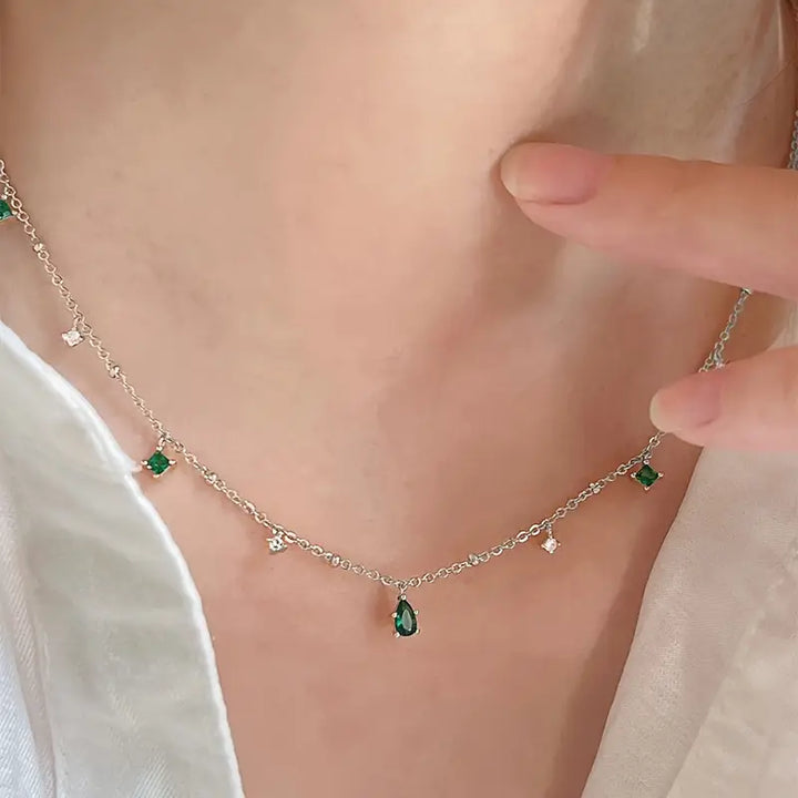 Gold Charm Necklace Eithne with Emeralds