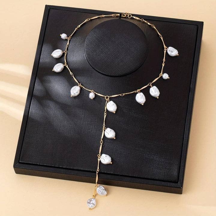 Gold Charm Necklace with Cascading Pearl Drops
