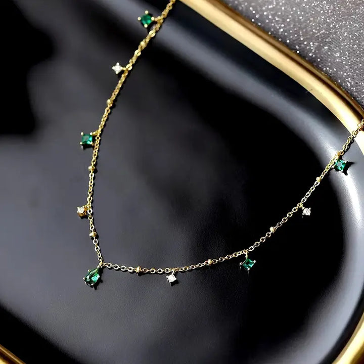 Gold Charm Necklace Eithne with Emeralds