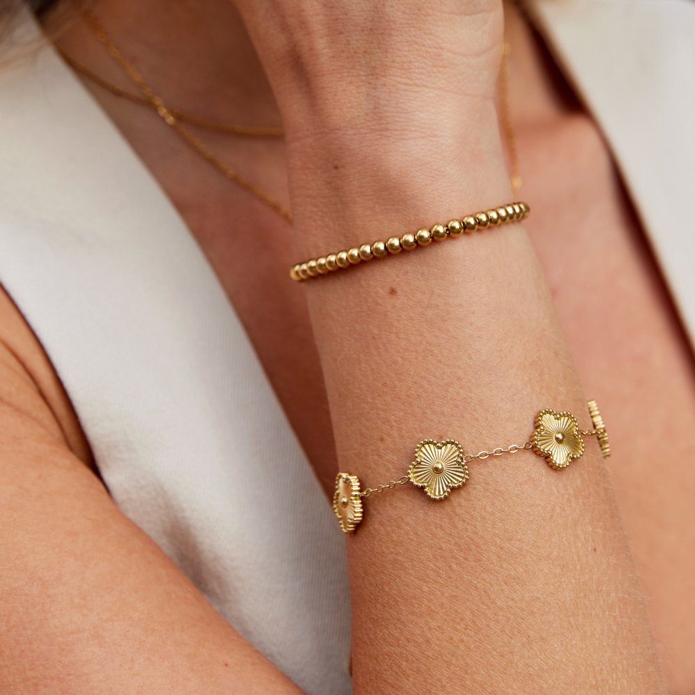 Gold Charm Bracelet Órla with Flower Motifs