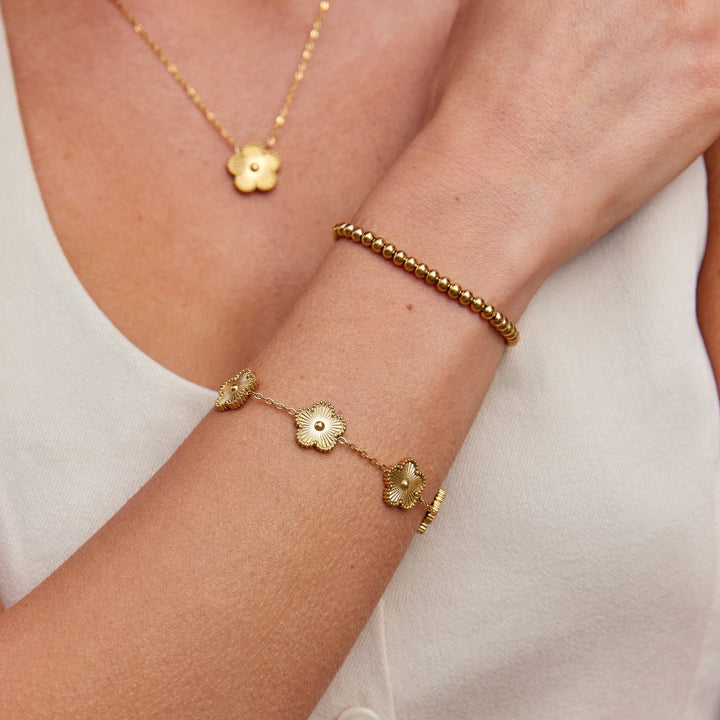 Gold Charm Bracelet Órla with Flower Motifs