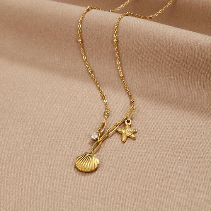 Gold Charm Necklace Eithne with Shell and Starfish