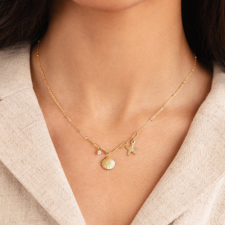 Gold Charm Necklace Eithne with Shell and Starfish