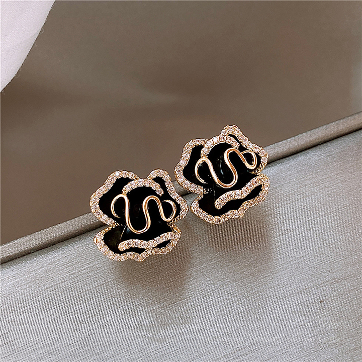 Gold Stud Earrings Órlaith with Black Lotus Flower