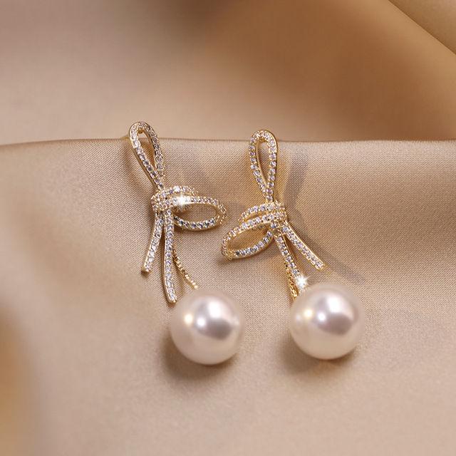 Gold Drop Earrings Cara with Zirconia Bow and Pearl