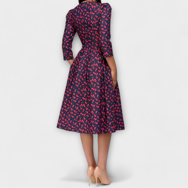Retrozo - Cremefarbenes knielanges Kleid mit Blüten