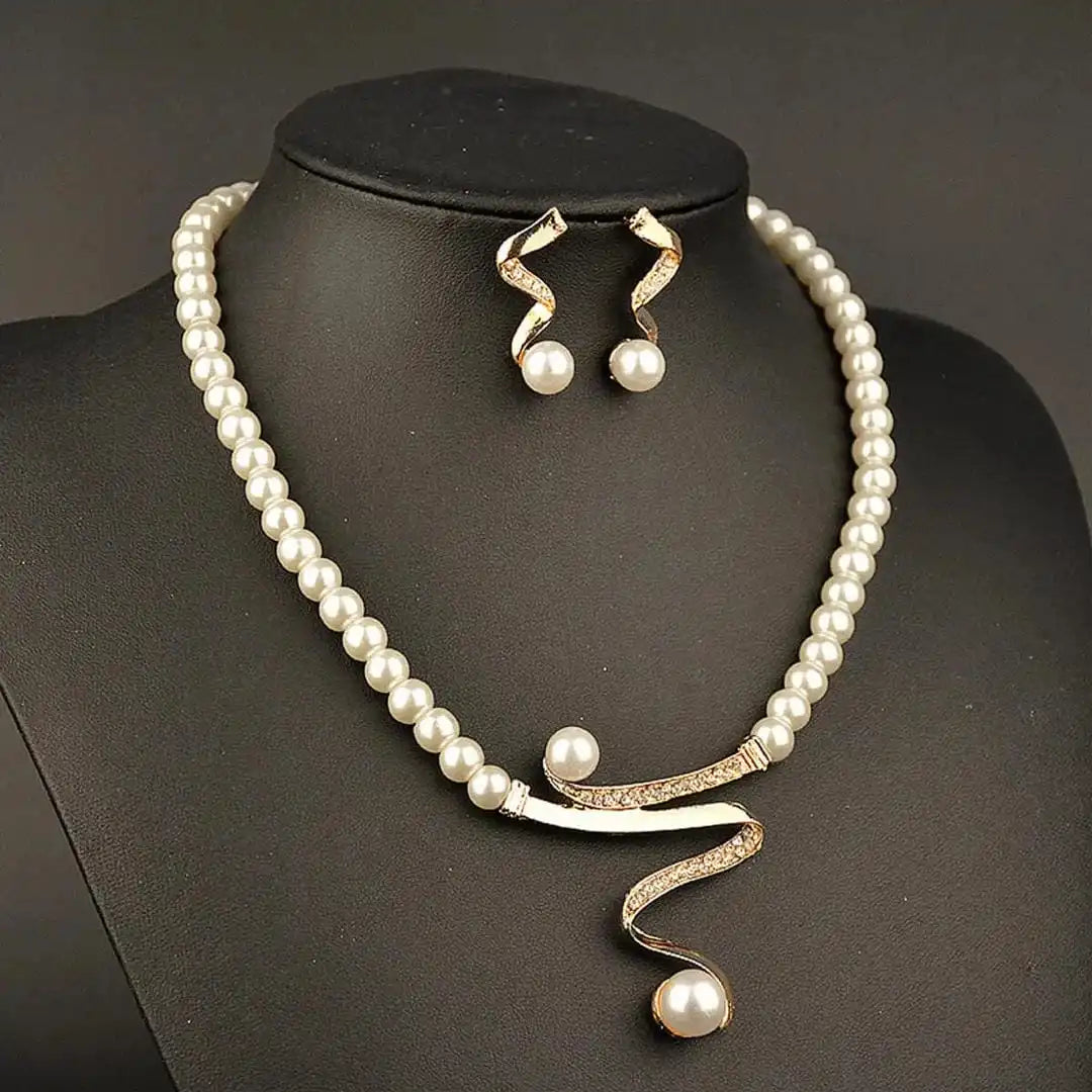 Gold Drop Earrings with Pearl and Serpentine Swirl