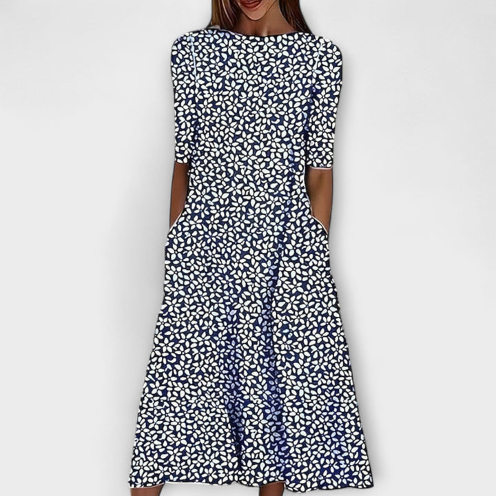 Adelina - Weisses Kleid mit blauem Blütenmuster
